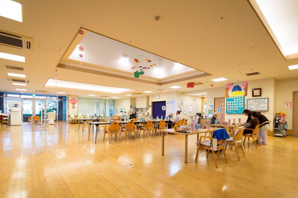 介護老人保健施設ふるさと（介護タクシー/ドライバーの求人）の写真5枚目：デイケアフロア。リハビリの機能訓練室を併設しています。